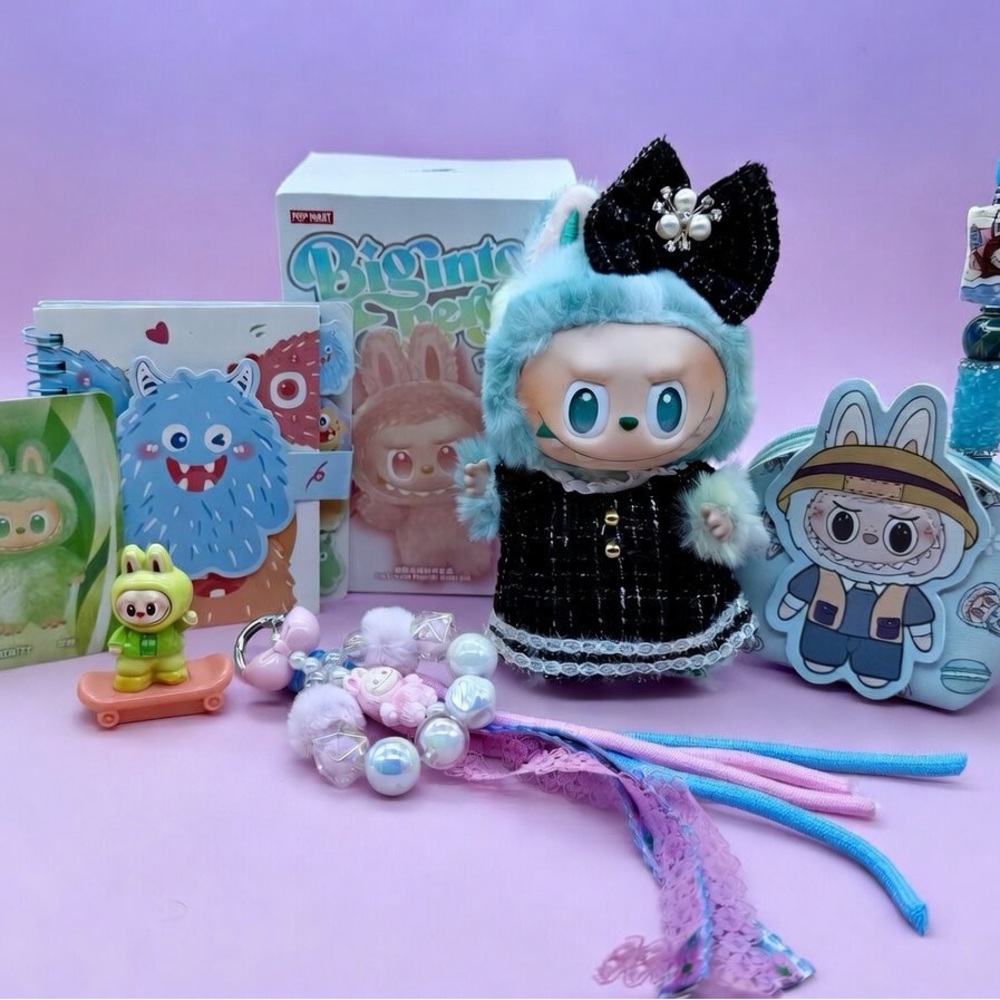 Light Blue Plush Bunny Doll with Black Dress and Bow with novelty accessories.